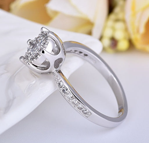 Delicate heart and soul zircon engagement ring