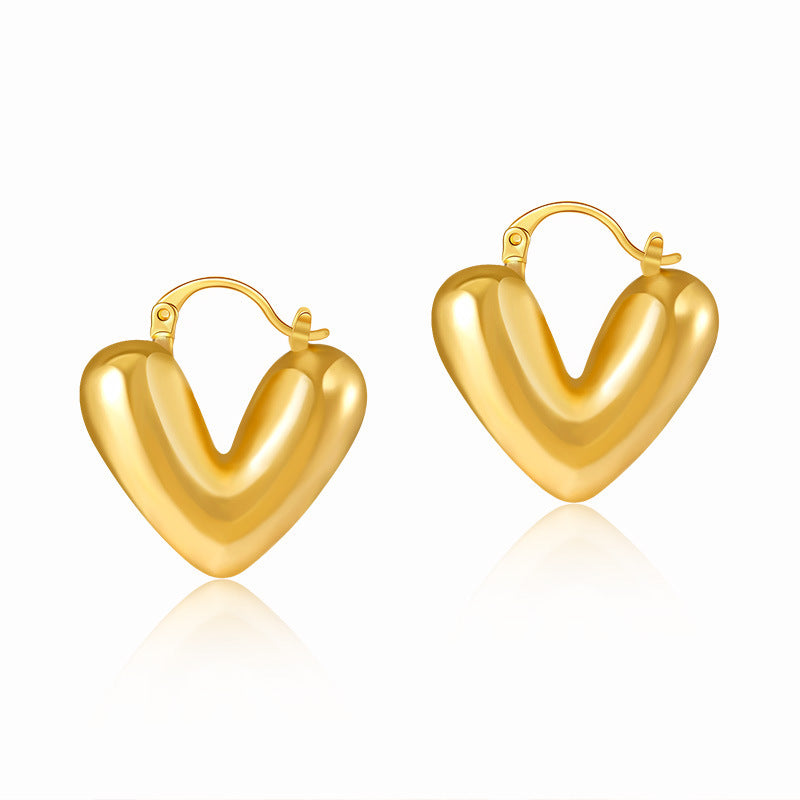 Product information: Treatment Process: Electroplating Color: KE1236 Applicable population: Female Material: Copper Purity: 18K Shape: heart shape Packing list: Earrings *1 pair Product Image: