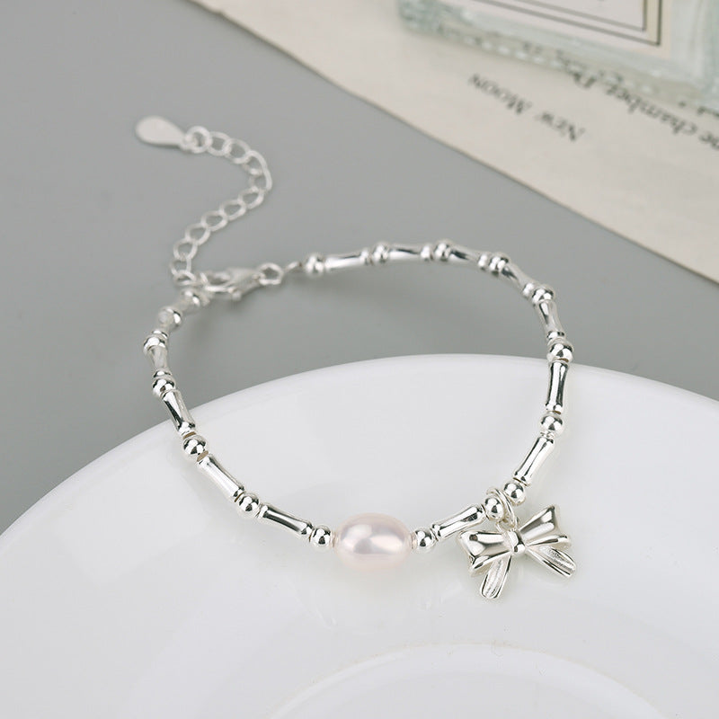 Trendy Pearl and Bow Bracelet