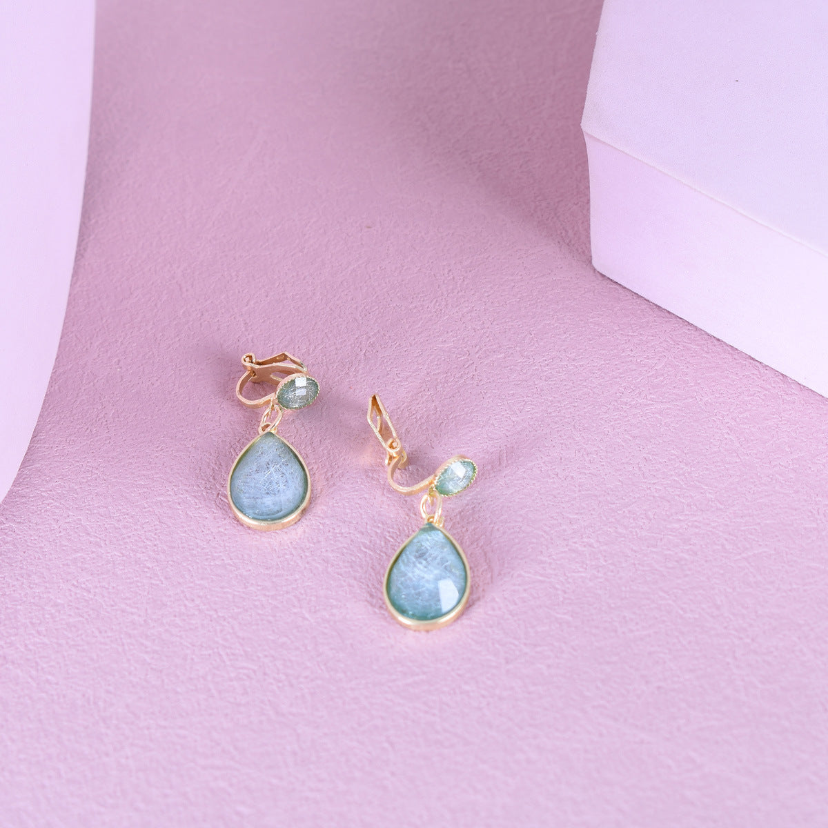 Product information: Treatment Process: Electroplating Color: water drop ear studs pairs, a pair of water drop ear clips Applicable population: Female Style: Women's Material: zinc alloy Shape: drop shape Size：3.1*1.2cm Packing list: Earrings*1Pair Produc