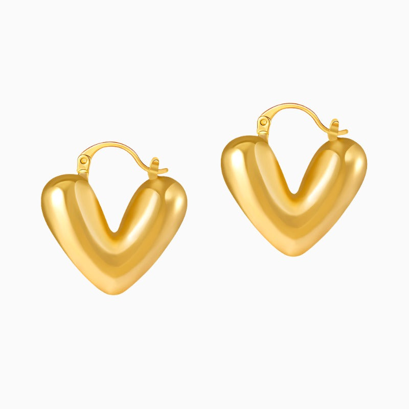 Product information: Treatment Process: Electroplating Color: KE1236 Applicable population: Female Material: Copper Purity: 18K Shape: heart shape Packing list: Earrings *1 pair Product Image: